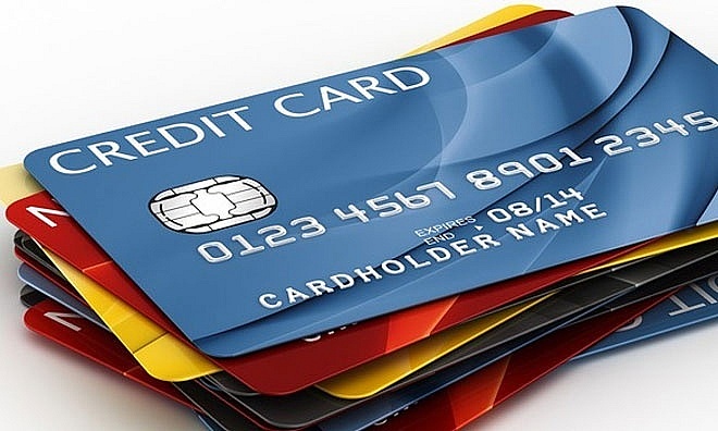 Thẻ Visa và thẻ ATM nội địa khác nhau thế nào, dùng ra sao? - Ảnh 1.